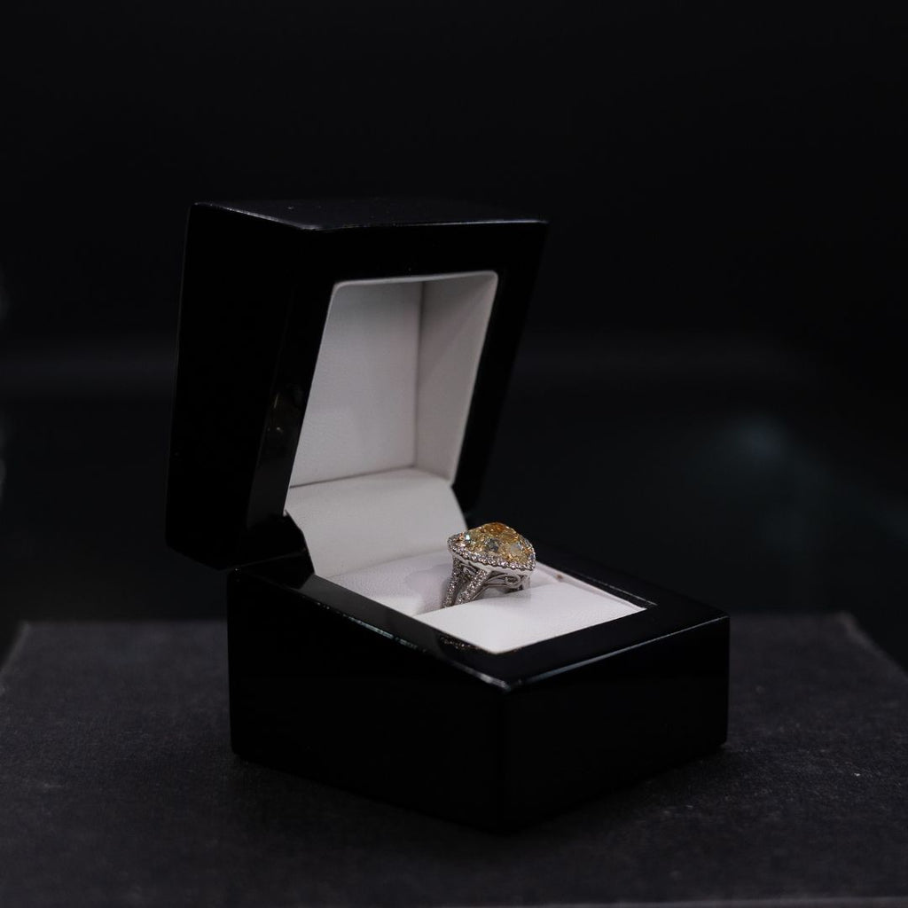 14ct White Gold Heart Shaped Diamond Ring (6.35ct Heart Shaped Diamond Clarity P1 with 28 Round Brilliant Cut Diamonds 0.27ct)